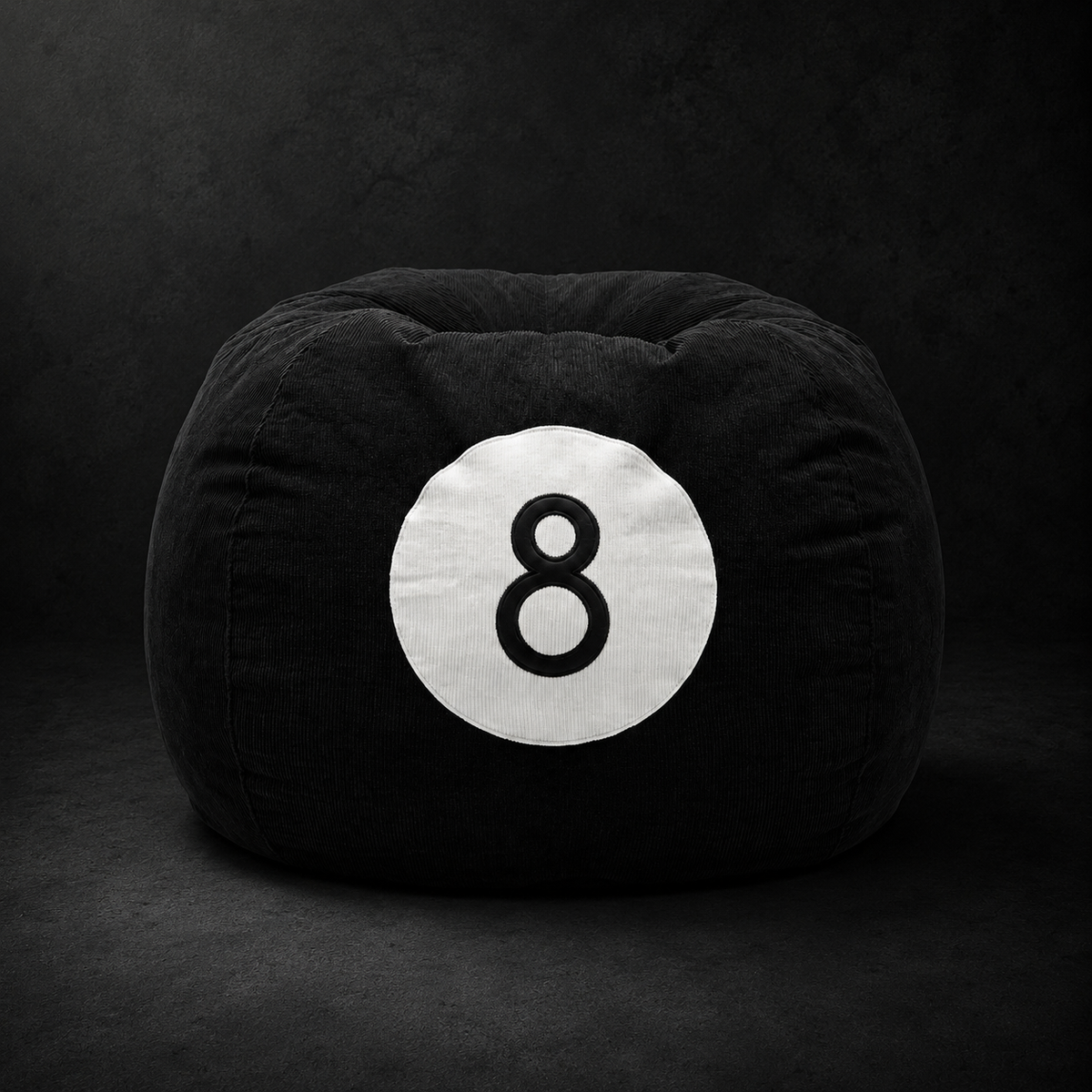 8 Black Corduroy Bean Bag by SeventySeven.DC — black corduroy 80 cm sphere bean bag with a white billiard eight ball patch, shown on a dark floor