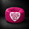 Softer Than Your Ex's Lies bean bag by SeventySeven.DC — hot pink leather 80 cm sphere bean bag with a white circular patch lettered softer than ur ex's lies