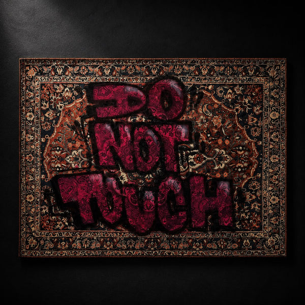 DO NOT TOUCH hand-sprayed graffiti carpet by SeventySeven.DC — magenta spray lettering over a navy and rust Persian medallion weave, 150x200 cm, edition of 5